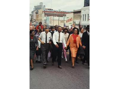King led a throng of 25,000 marchers through downtown Montgomery in 1965. 