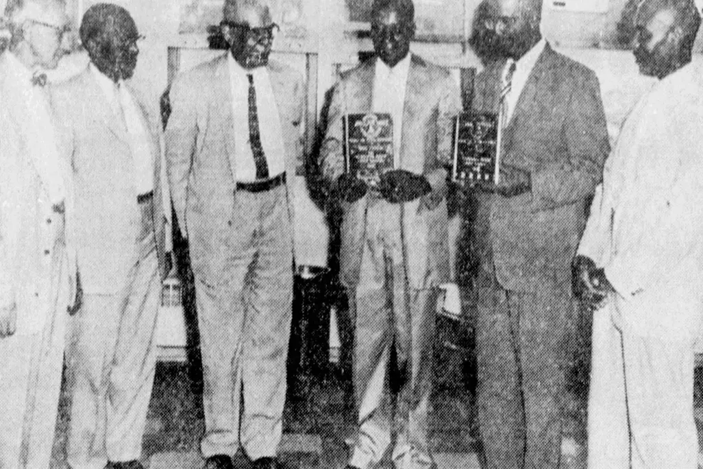 A 1959 photograph of Saxon, who is standing third from left