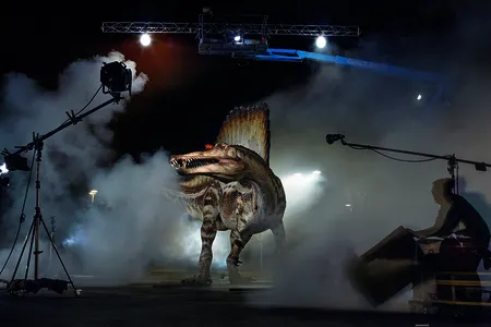 A model of Spinosaurus, based on data published in Science today, gets rock star treatment at a National Geographic photo shoot. A feature story, including the image above, will appear in National Geographic's October issue. 