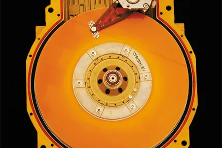 A DEC hard disk drive c. 1980. The invention let users jump directly to data they wanted without scrolling through a tape; when later installed in PCs, the hard disk brought real computing power to the people.