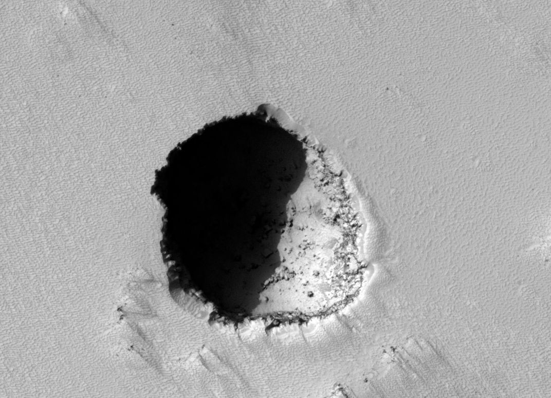 200-yard-wide pit on Mars