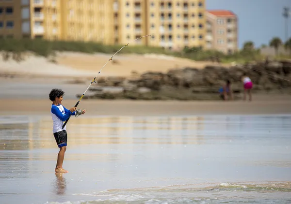 Fishing on the beach thumbnail