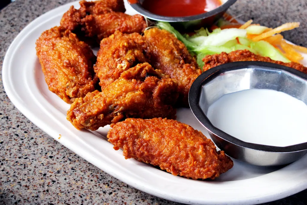 A plate of buffalo chicken wings