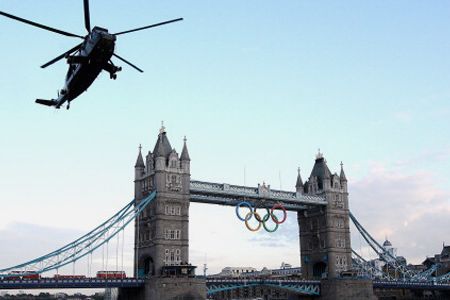 The Olympic flame arrives in London onboard a Sea King Helicopter on July 20.