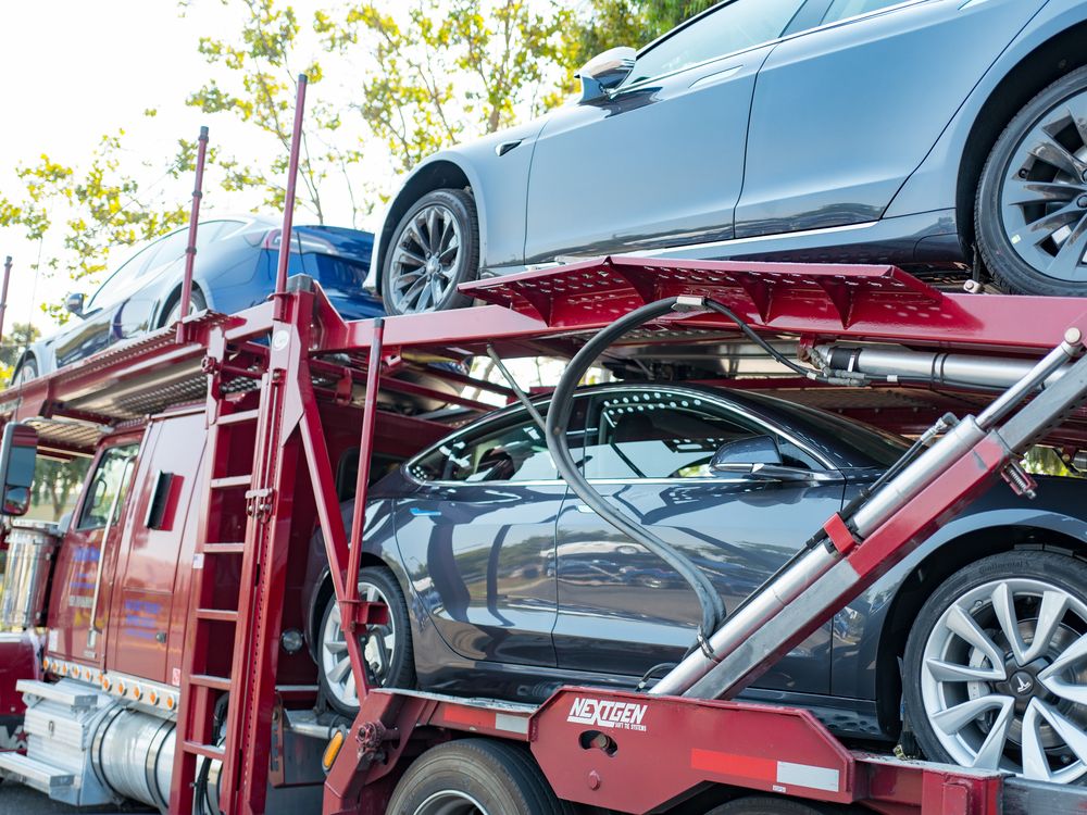 Tesla electric cars on a car carrier truck