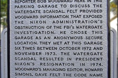 A plaque outside of the Rosslyn, VA garage where the informant code-named "Deep Throat" met with journalist Bob Woodward during the Watergate investigation.