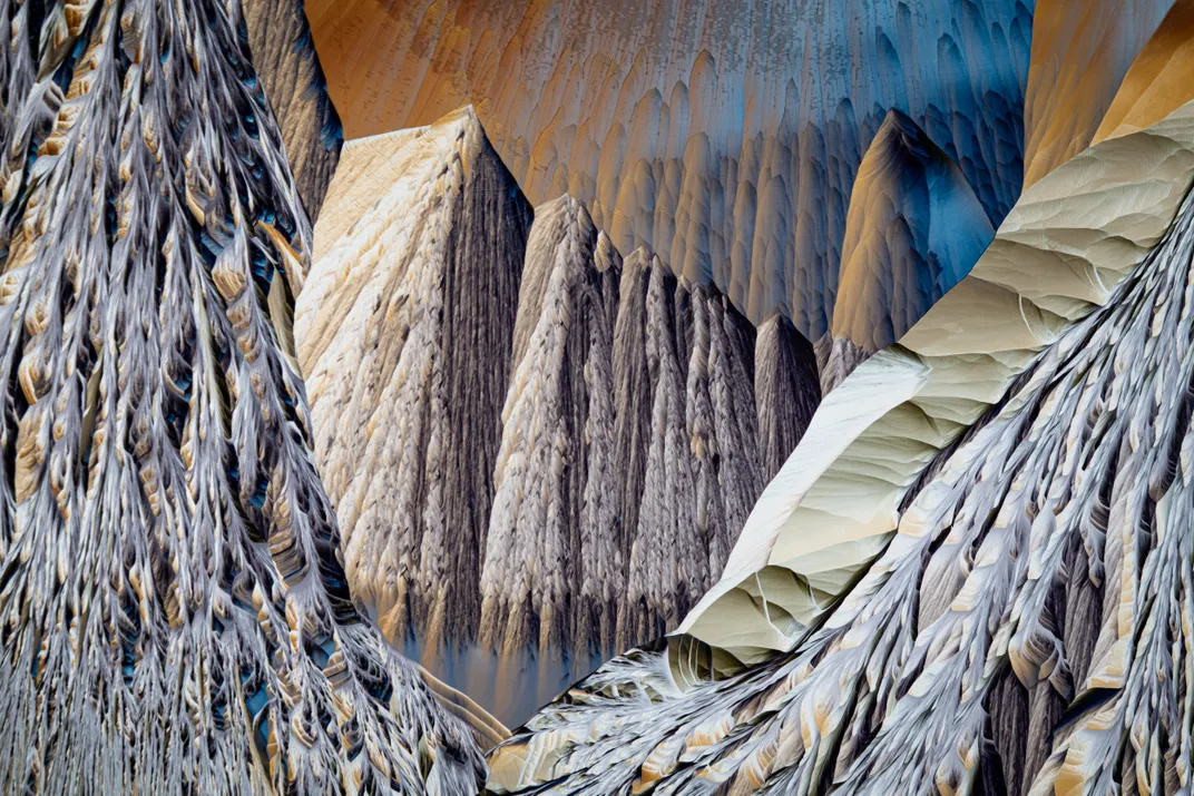 a scene with towering pillars that look like snow-covered mountains