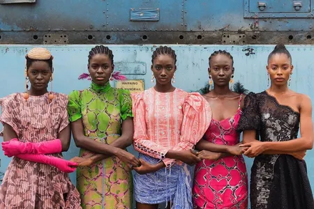 Models holding hands in Lagos, Nigeria, in 2019