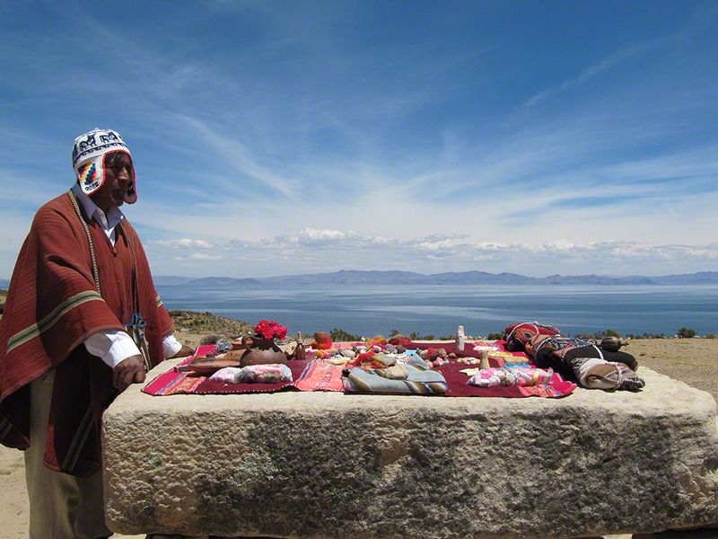 A shaman priest prepares for a community ceremony on the Island of the