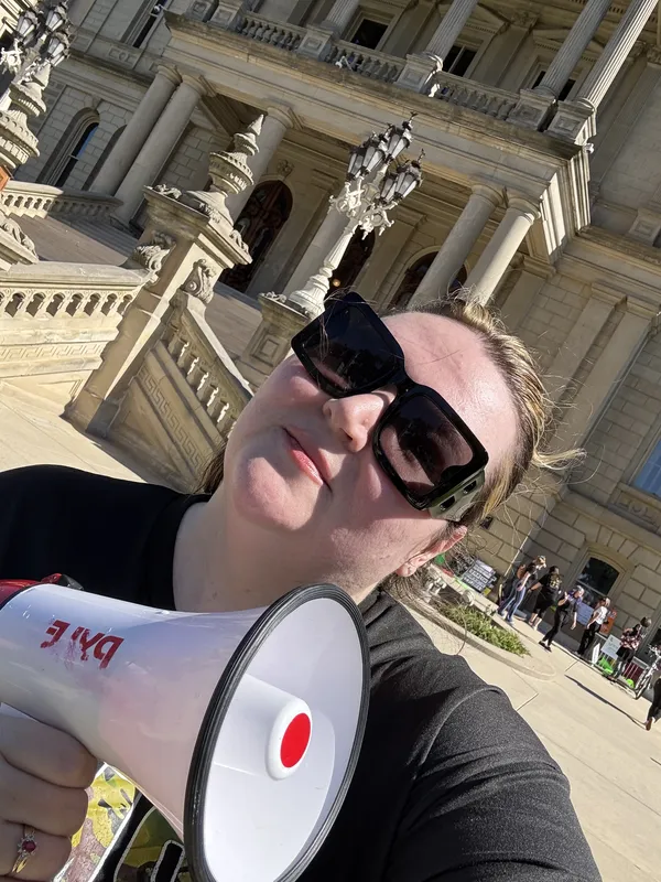 Brandi Crawford protesting for Public Health and Environmental Health at the State Capitol in Michigan thumbnail