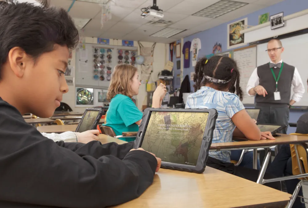 Middle school students learning with educational resources on American Indian removal produced by the National Museum of the American Indian. (Alex Jamison)