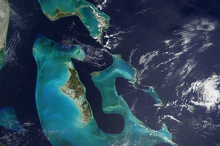 The Bahamian Andros Island, surrounded by the bright blue of Great Bahama Bank.