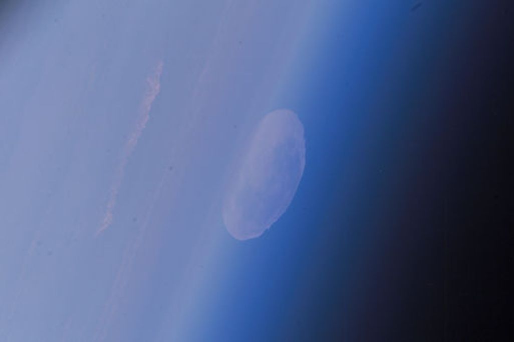 Space station astronauts get an odd view of the full Moon.