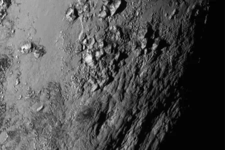 Turns out Pluto is covered in ice mountains up to 11,000 feet high.