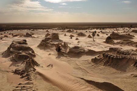 The mysterious skeleton emerged from Lake Mungo, a dry lakebed in Australia marked by sand drifts.