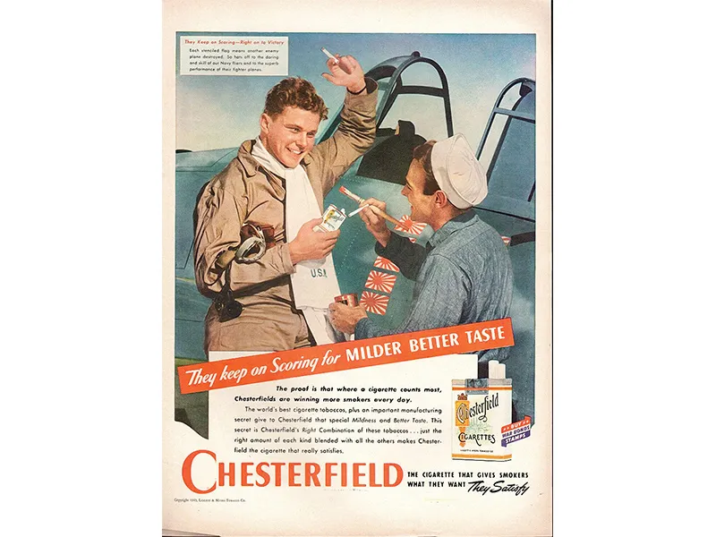 ad for Chesterfield cigarettes featuring two servicemen smoking