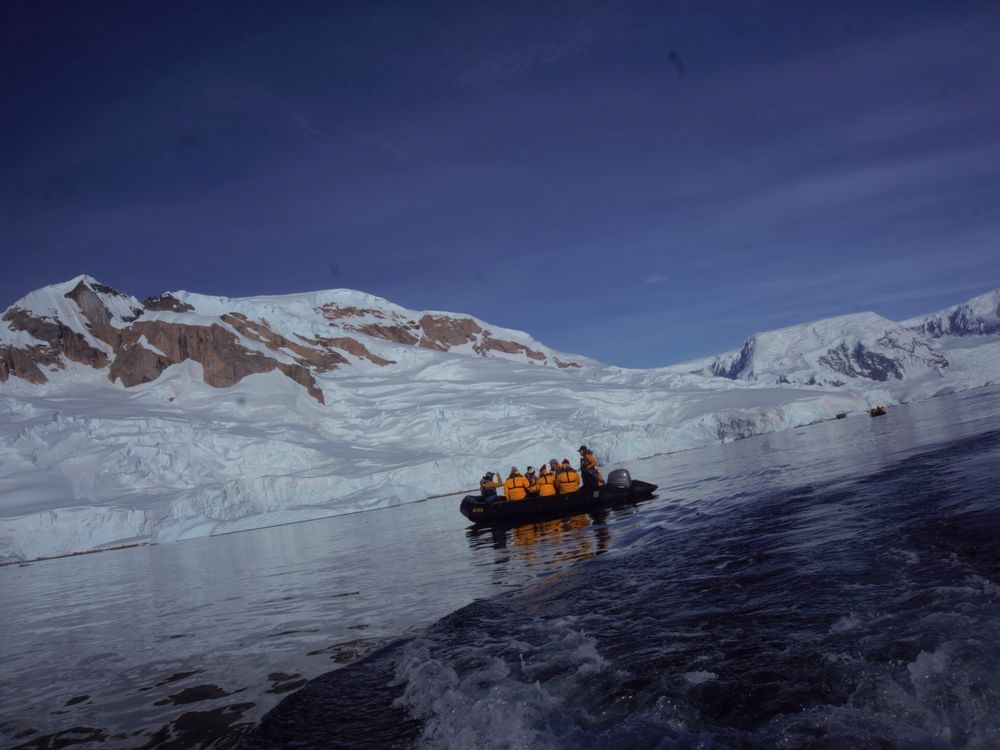 Exploration Zodiac boat in waving waters of Antarctica. Camera: Sony ...