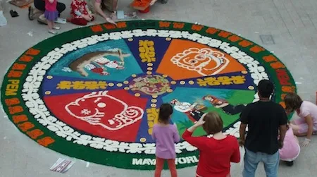 This weekend families can help create saw-dust carpets, a 400-year-old tradition in Guatemala, where everyone lends a hand to create colorful works of art.
