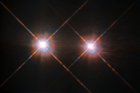 Our stellar next-door neighbors, Alpha Centauri A (left) and B, shine brightly in this Hubble Space Telescope image.