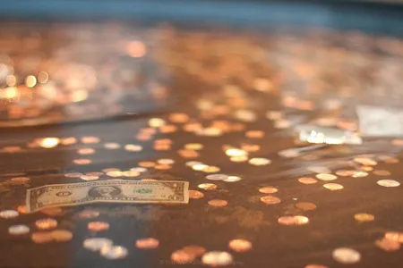 Money tossed into a fountain at New York City's Metropolitan Museum of Art.