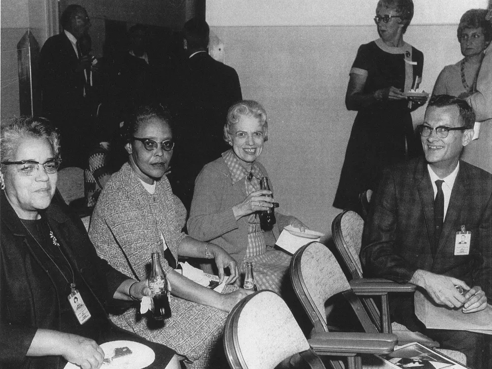 This photo, donated by B. Golemba to the Langley Research Center, shows a few of the institution's human computers. Human computers were often women who helped to crunch data before the wide-spread use of electronic computers. Left to Right: Dorothy Vaughan, Lessie Hunter, Vivian Adair (Margaret Ridenhour and Charlotte Craidon in back). Credit: NASA