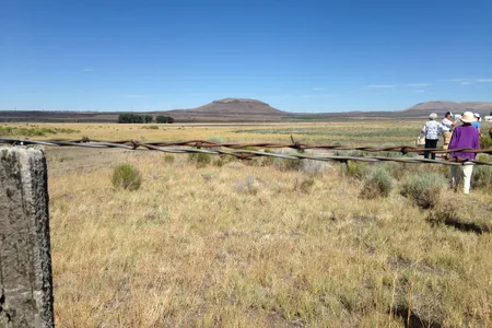 Participants on a bus tour at the 2014 community pilgrimage to Tule Lake