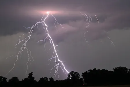 Lightning strikes over the countryside near Potsdam, Germany, on July 10, 2024, following a period of high temperatures.