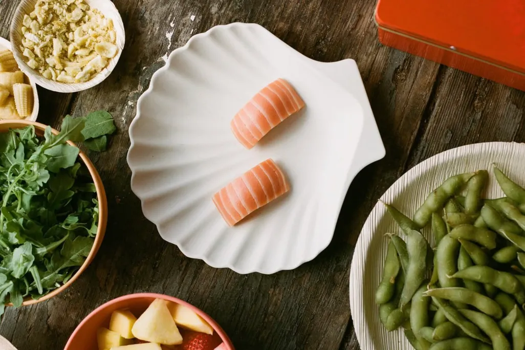 Wildtype's lab-grown salmon on a shell-shaped plate