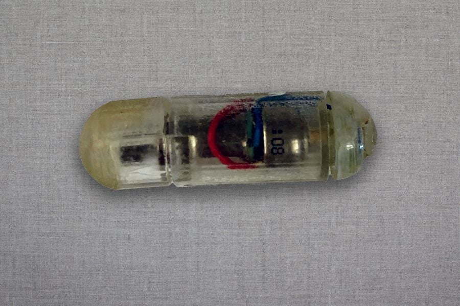Small pill with electronics inside