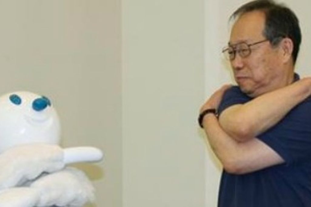 Taizo the robot gets seniors to exercise.