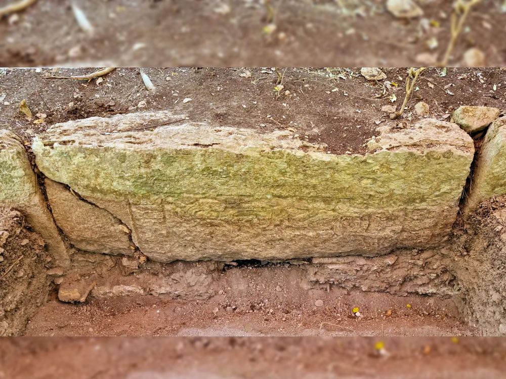 An inscribed stone found at the Ocomtún site