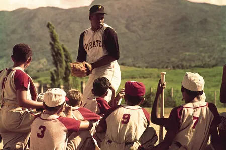 The Pittsburgh Pirates All-Star Roberto Clemente was greatly admired by his Puerto Rican community (above: in 1962 coaching a local children's team) for his philanthropic pursuits on the island. 