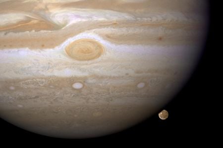 Jupiter and its largest moon Ganymede are shown in this image. Ganymede is slightly larger than the planet Mercury. Meanwhile, Jupiter's new 80th moon is much smaller, likely only a few dozen miles in diameter.

