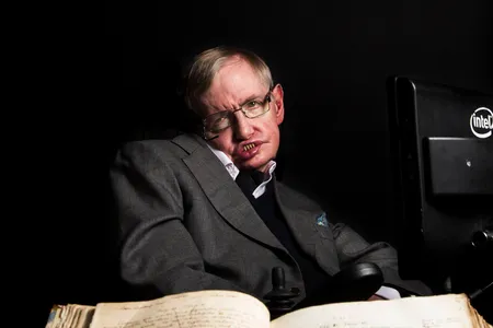 Stephen Hawking with Isaac Newton's annotated copy of Principia Mathematica
