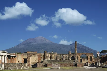 The ruins of Pompeii with Mount Vesuvius in the background. The city was destroyed during an infamous volcanic eruption in 79 C.E., and new research suggests an earthquake may have contributed to the damage and death toll.