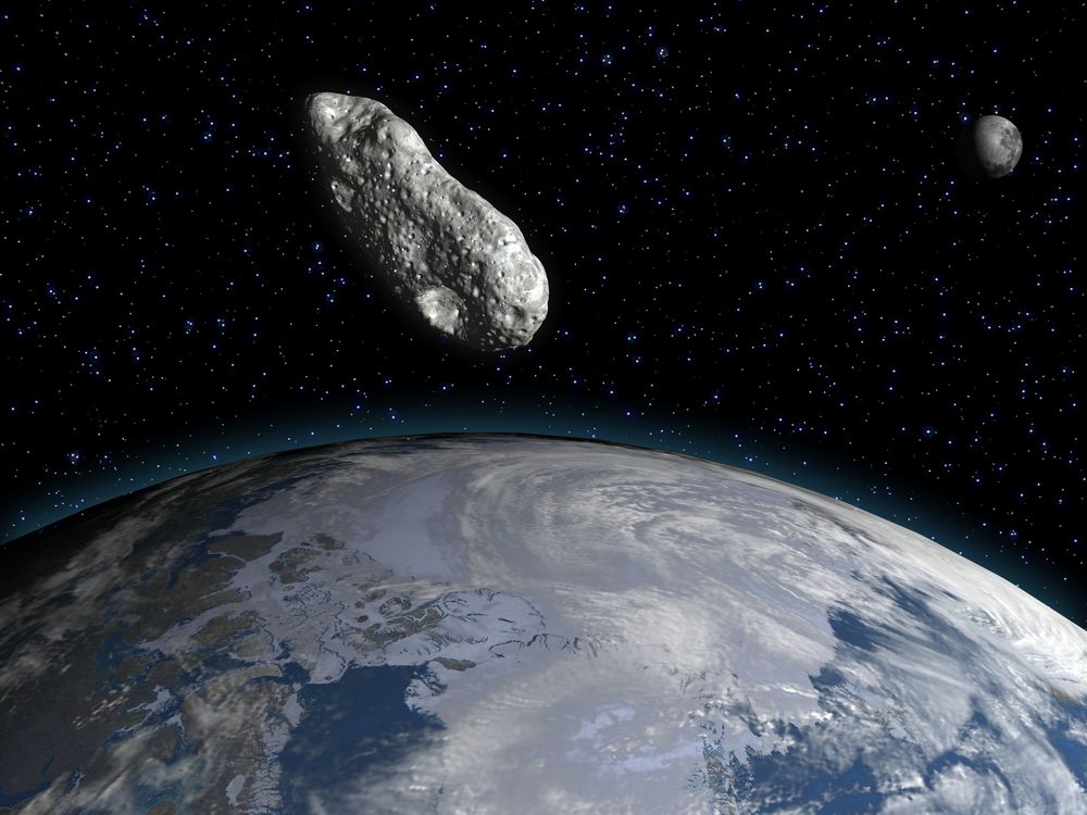 an asteroid flying through space above Earth, with the moon visible in the background