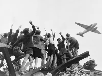 Berlin Children Cheering Airlift Plane