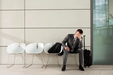 Don't be like this guy. Read our roundup of tips on the best ways to prevent and reduce stress during your airplane trip.