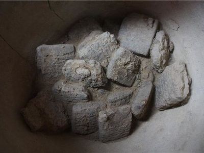 The cuneiform clay tablets discovered inside a ceramic pot.