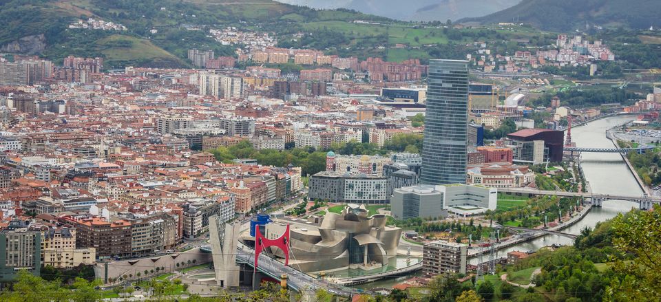  The city of Bilbao, with the Guggenheim Museum, set amid the Basque countryside 