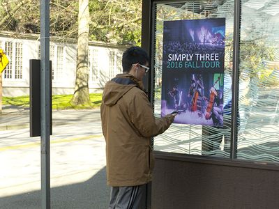 Engineers tested the new technology with this poster at a Seattle bus stop.