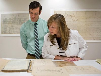Janette Davis and her son Keith Yoerg inspect their famous relatives’ patent documents. 