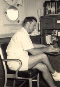 Lt. Minter Dial in the captain’s cabin of the U.S.S. Napa, composing a letter in autumn of 1941.