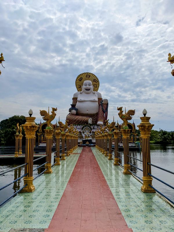 Laughing buddha at the island temple of Koh Samui thumbnail