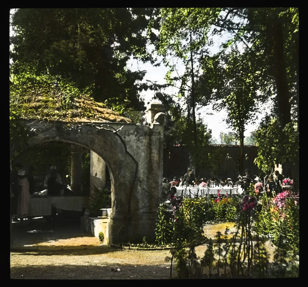 a scene of a garden with gazebo