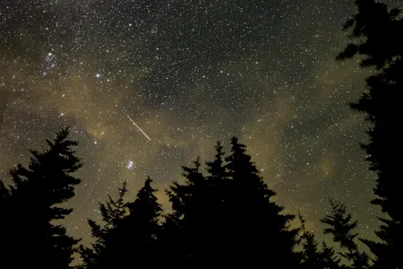 The Perseids occur when Earth passes through the debris field of the comet 109P/Swift-Tuttle.