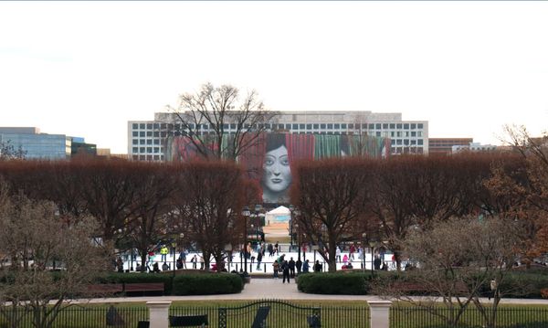 Mural overlooking ice skaters in National gallery of art Sculpture Garden thumbnail