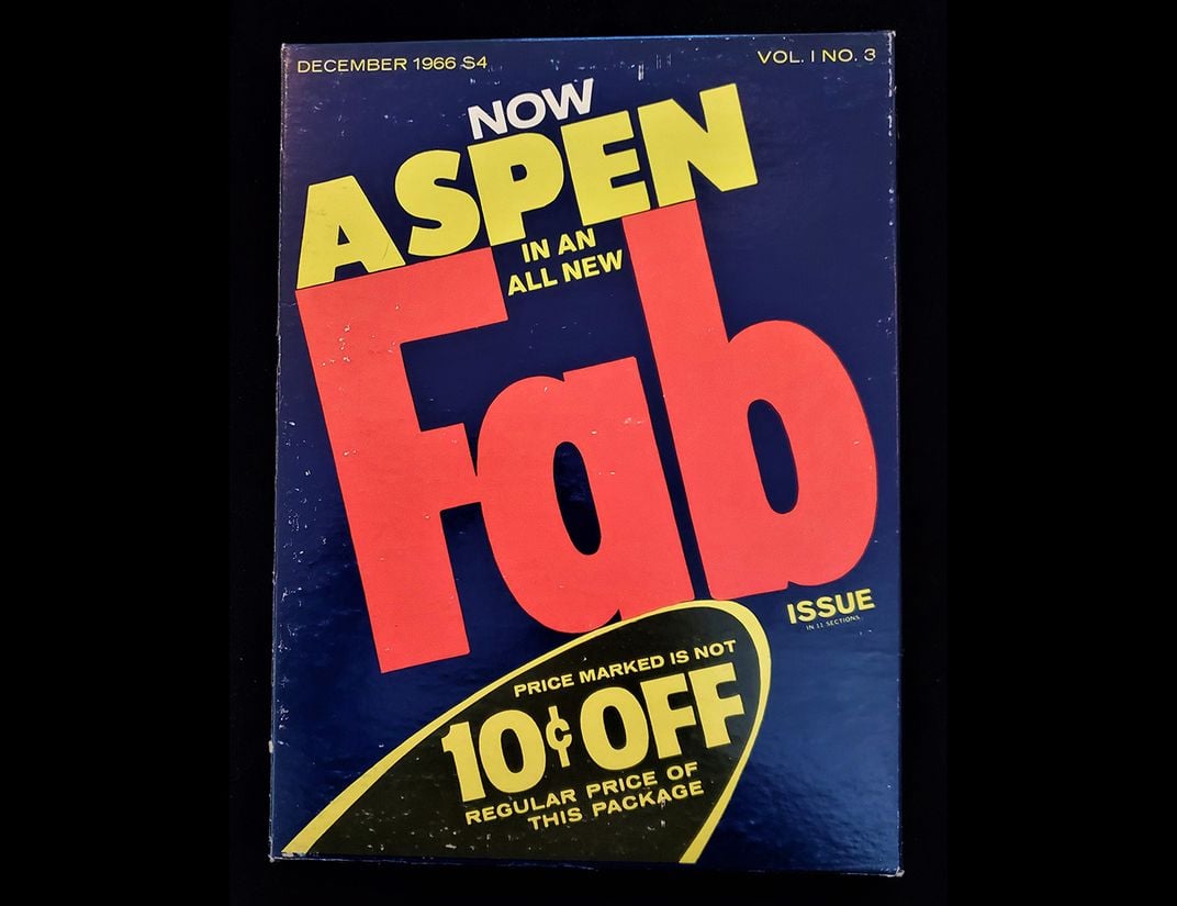 Magazine cover with "Fab" printed in large orange letters in center. Yellow "Aspen" directly above.