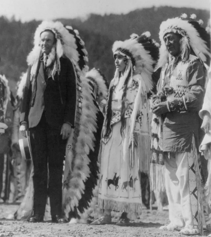 Coolidge at the 1927 ceremony marking his adoption by the Sioux