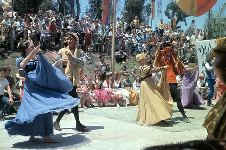 Performers at the 1963 Renaissance Pleasure Faire. Ron Patterson, a co-founder of the event, appears in orange at the far right.